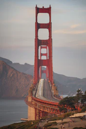 Golden gate bridge with light trails at dusk