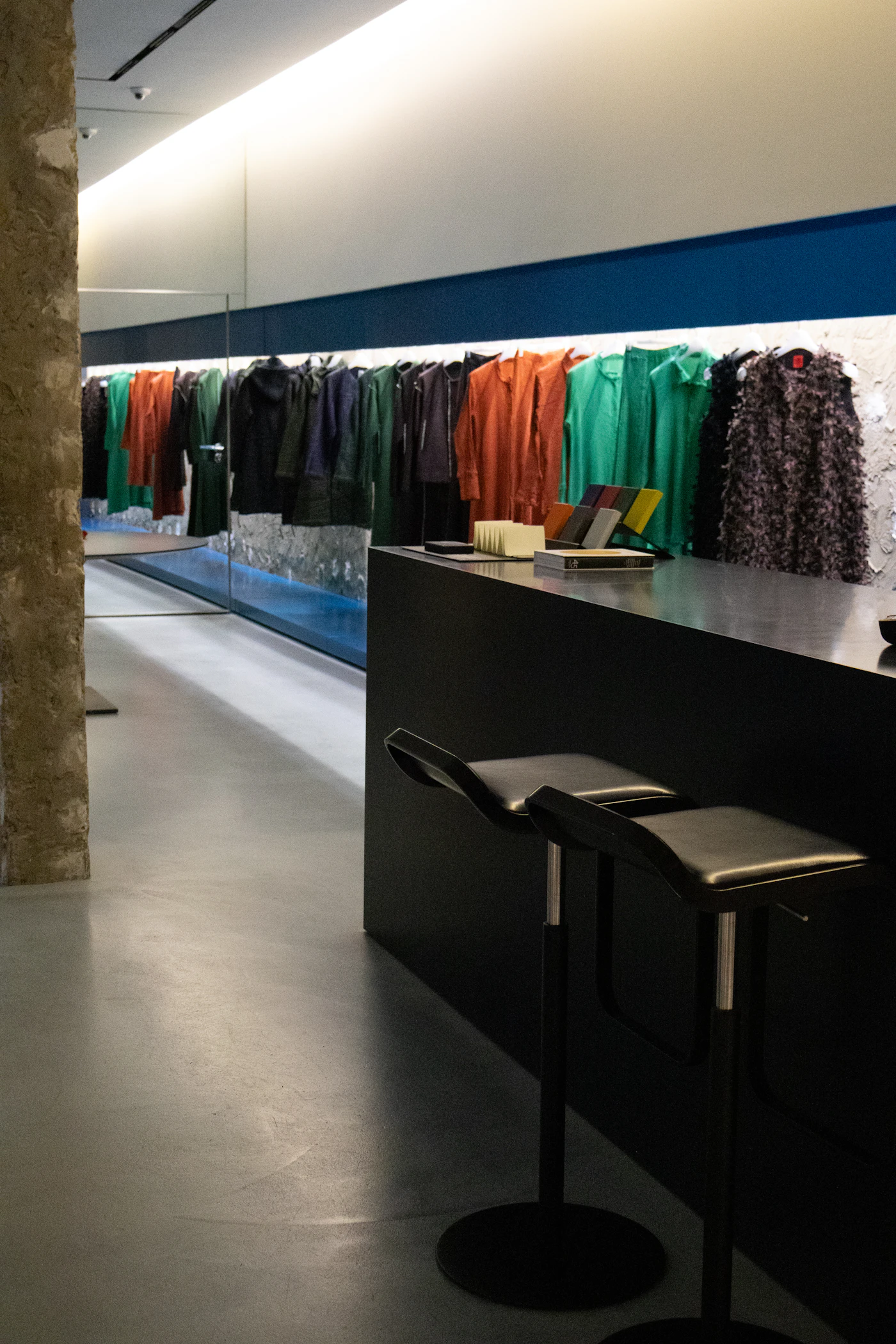 Store interior with colourful garments on display
