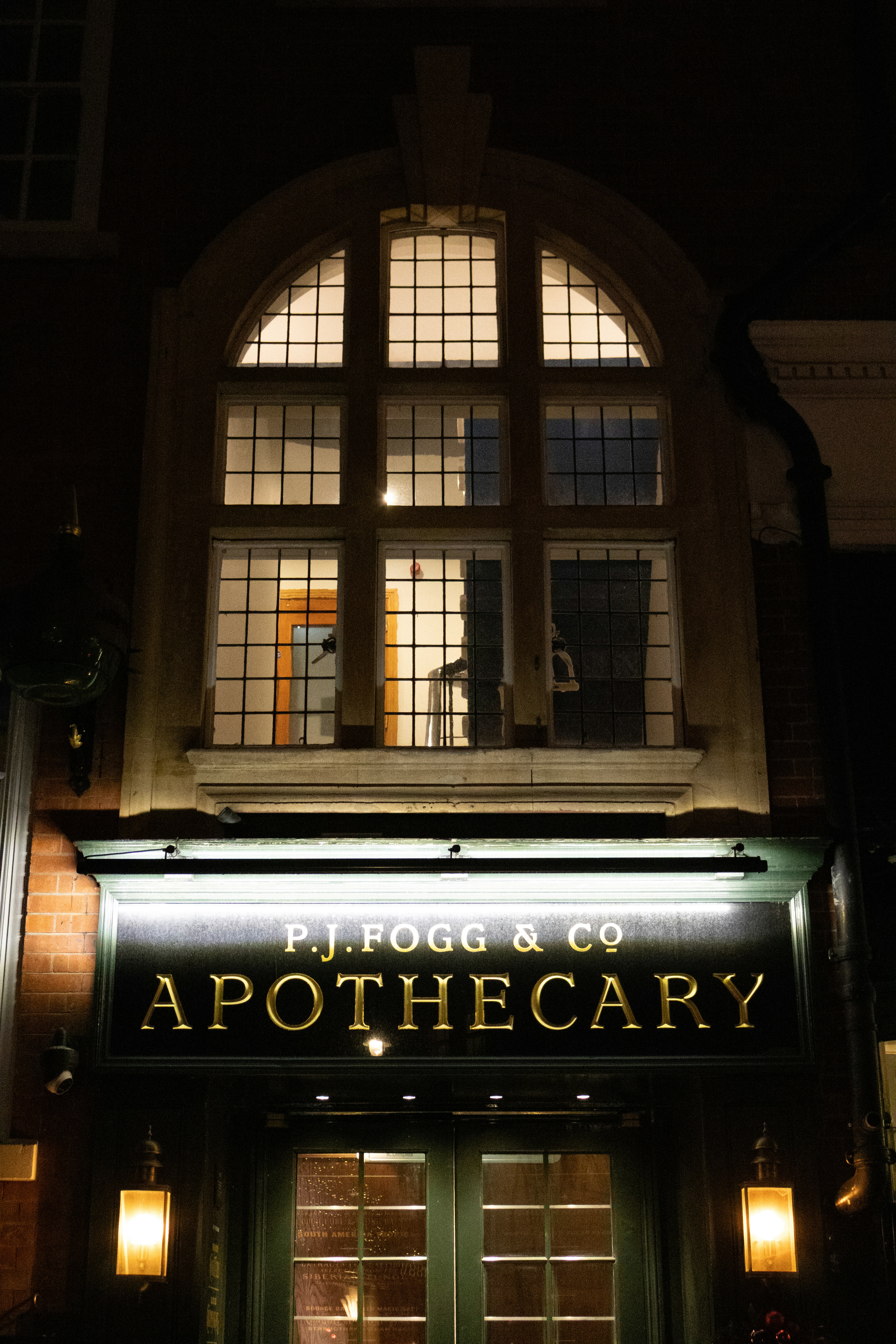 P.j. fogg & co. apothecary at night
