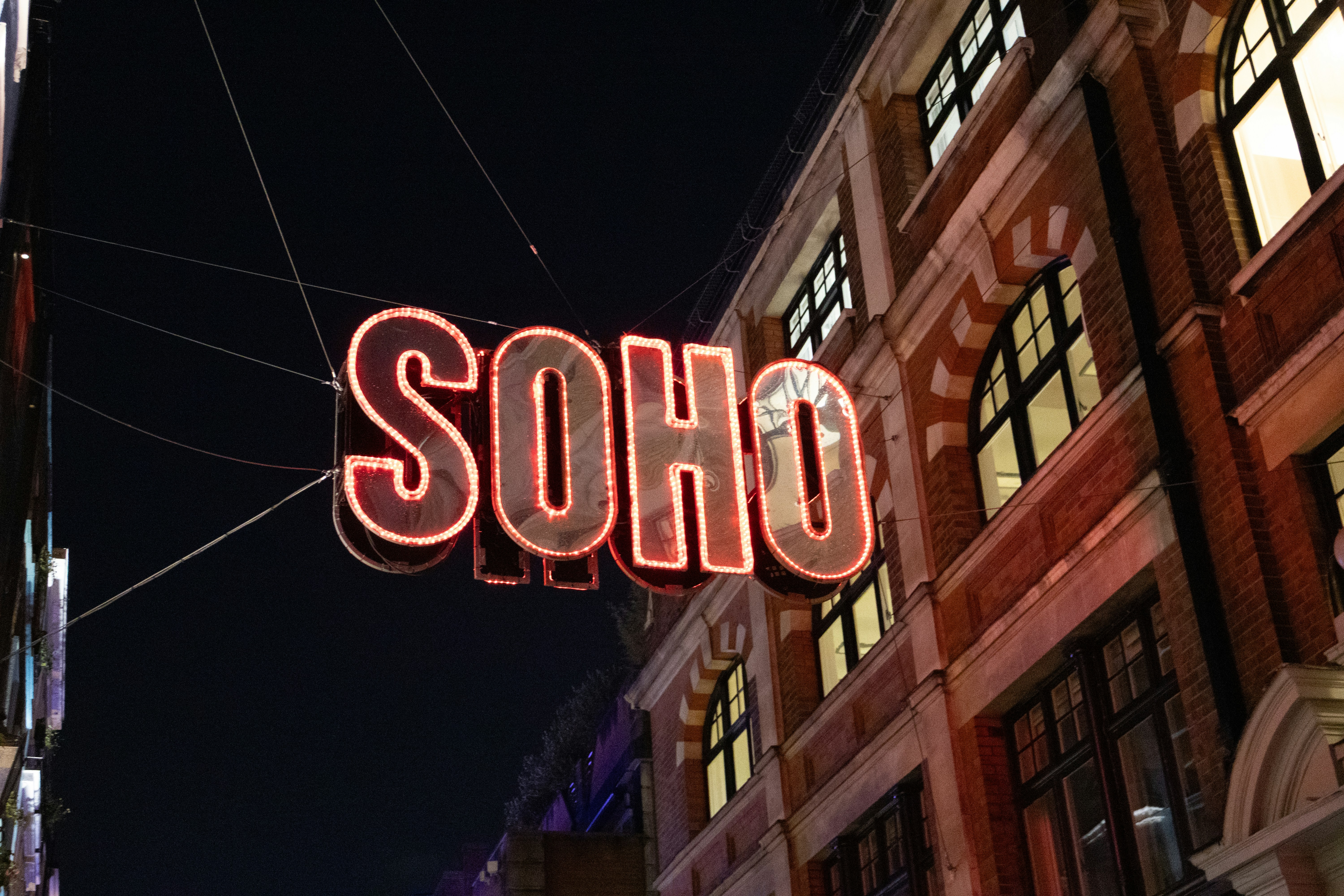 Soho neon sign glowing at night