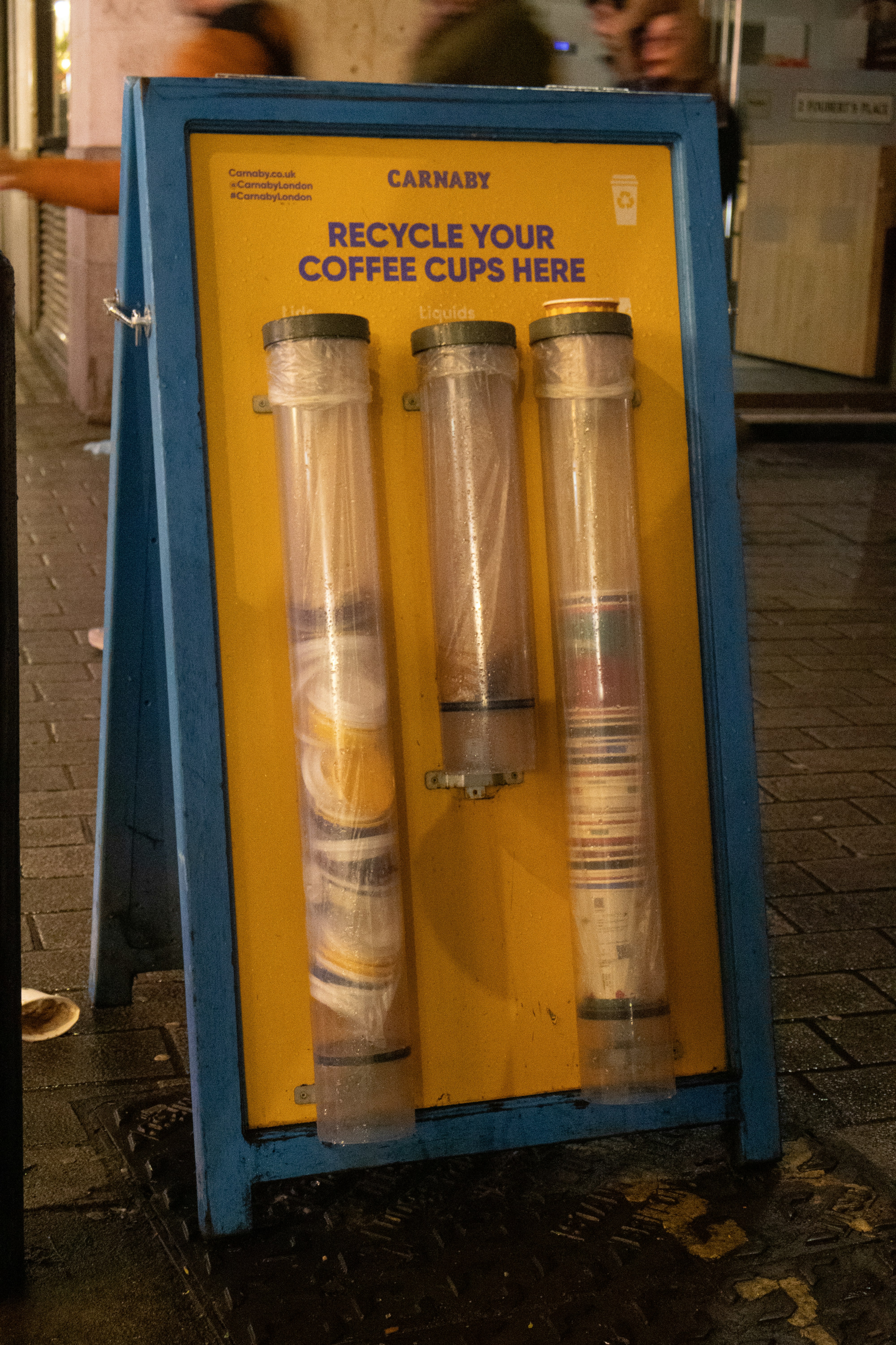 Recycling bins for coffee cups on street