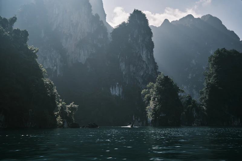 Beautiful sunset over Sun Moon Lake with golden sky reflected on the water