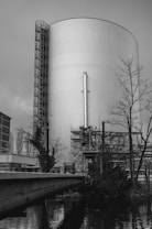 Industrial silo structure with pipes and trees