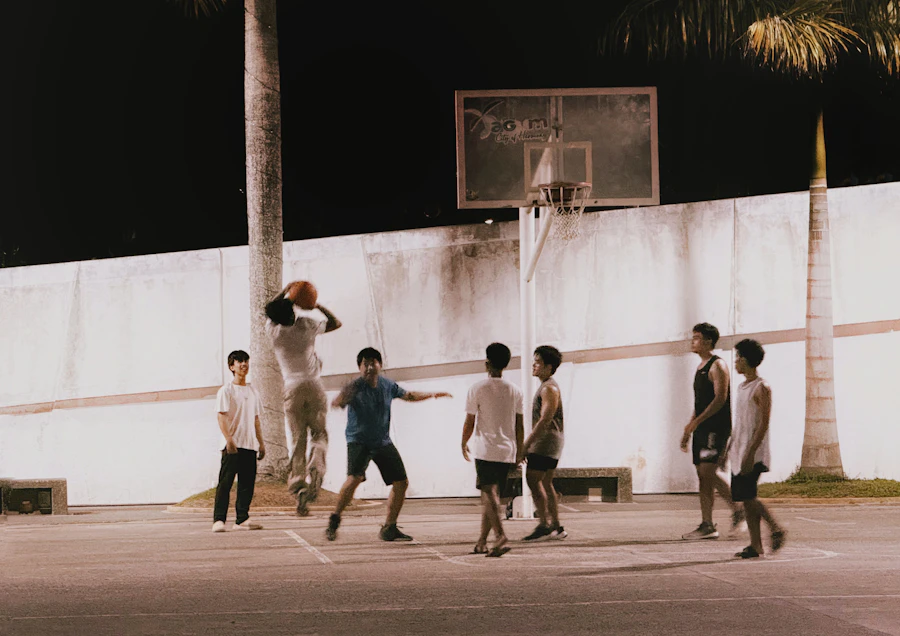 Youth basketball game on an outdoor court