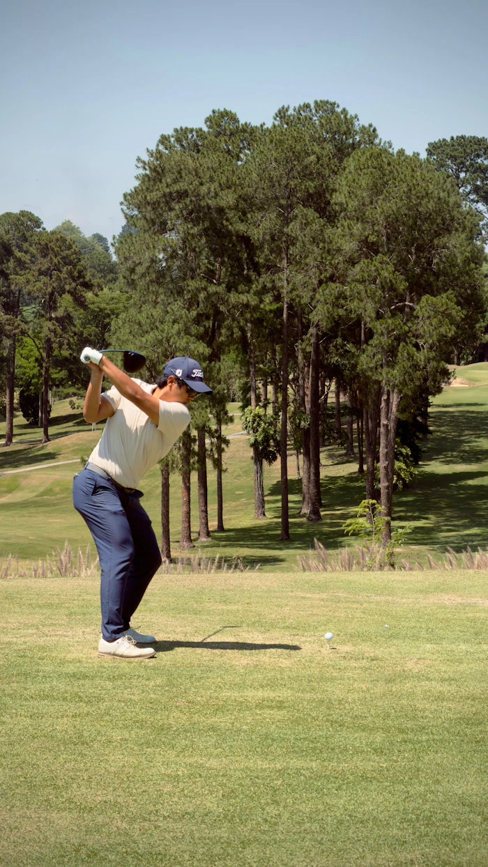 Golfer mid-swing