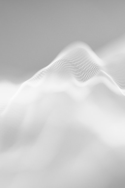 Abstract white wavy surface with grid pattern