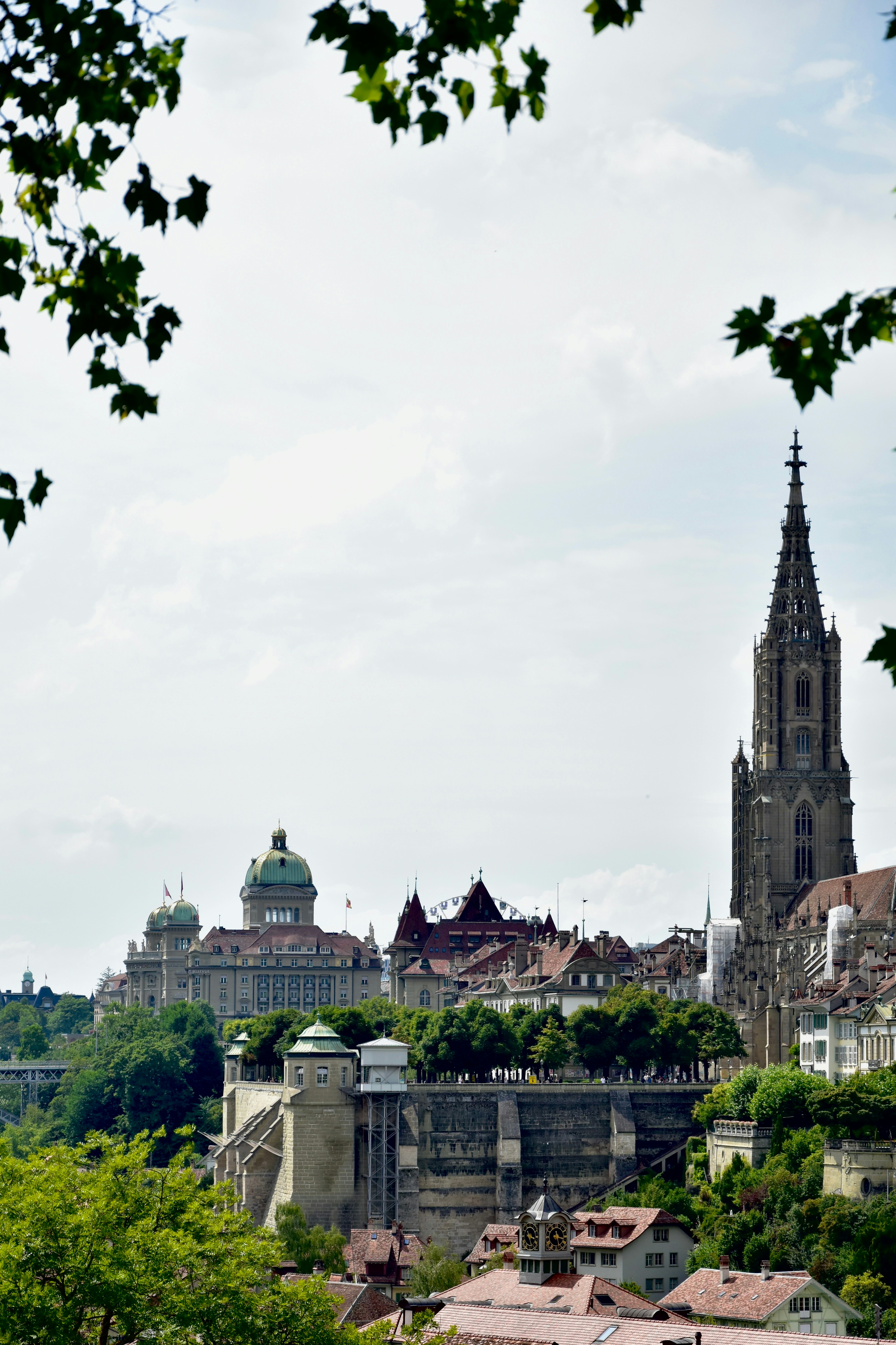 Historic european city skyline with cathedral and government buildings.