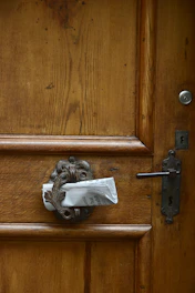 Newspaper in a decorative door knocker