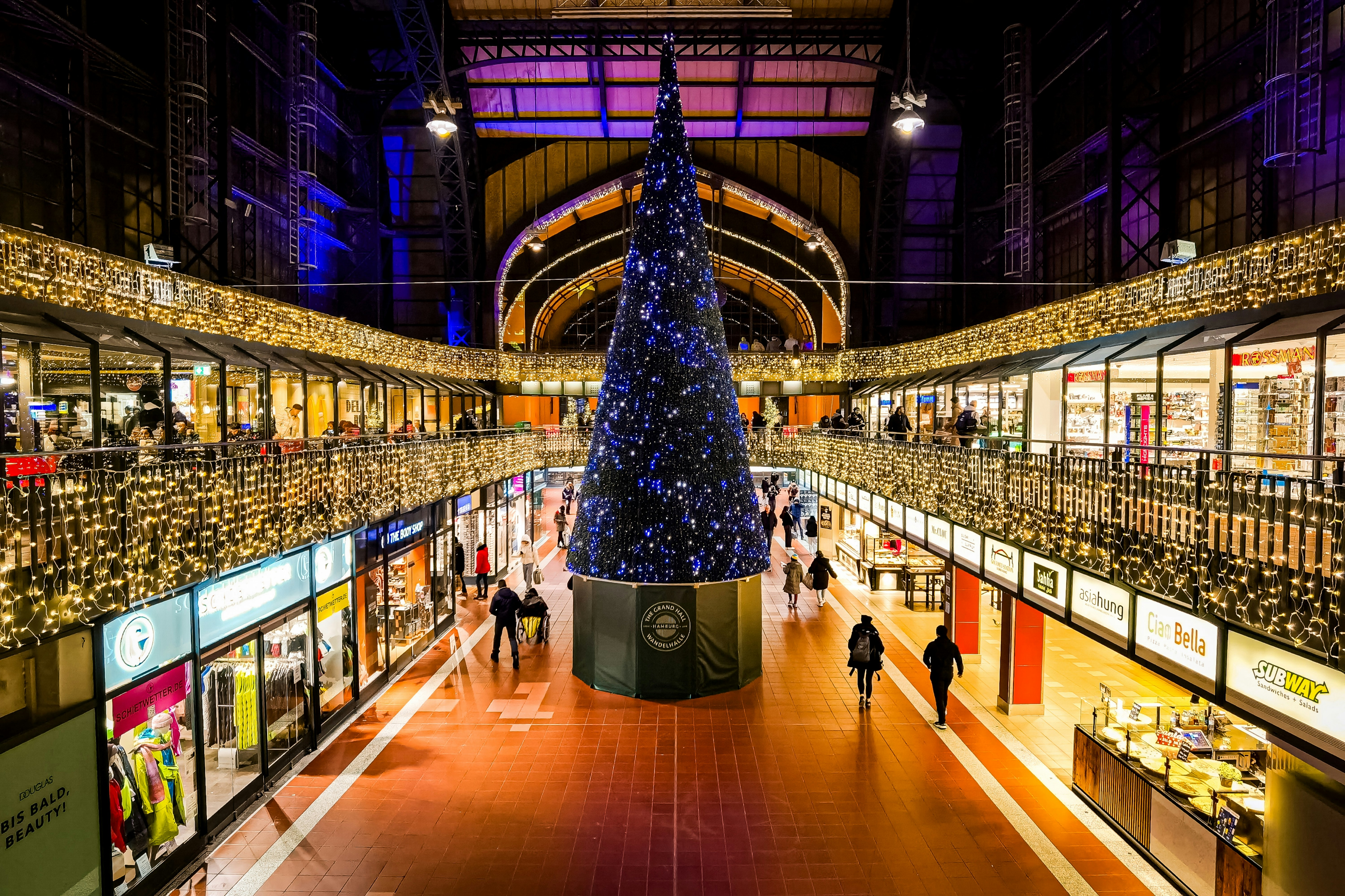 Large decorated christmas tree in a shopping mall.
