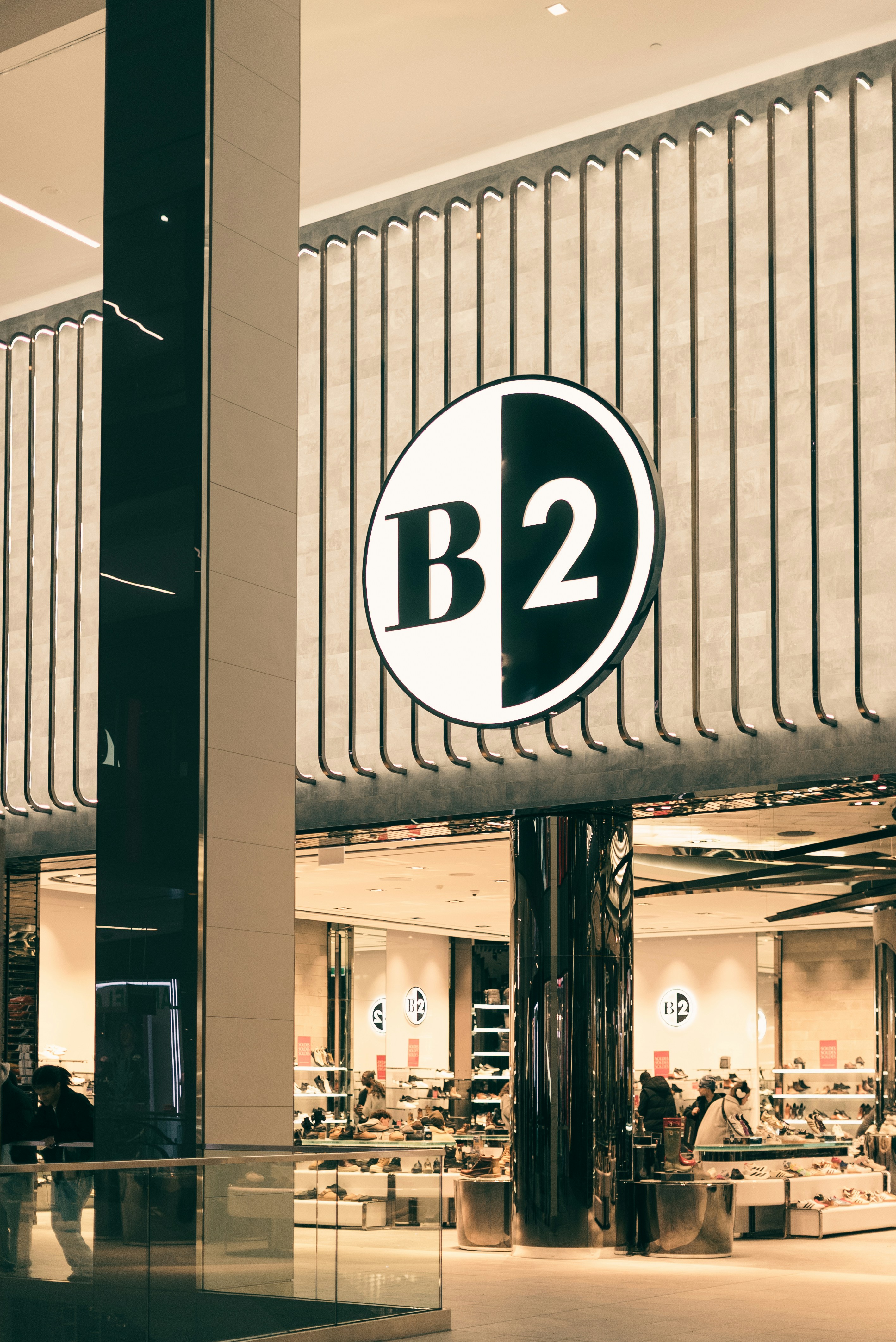 Modern storefront with b2 logo and interior view