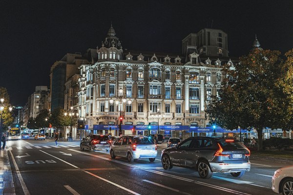 A Belle Époque building lit up at night — Oviedo, Spain