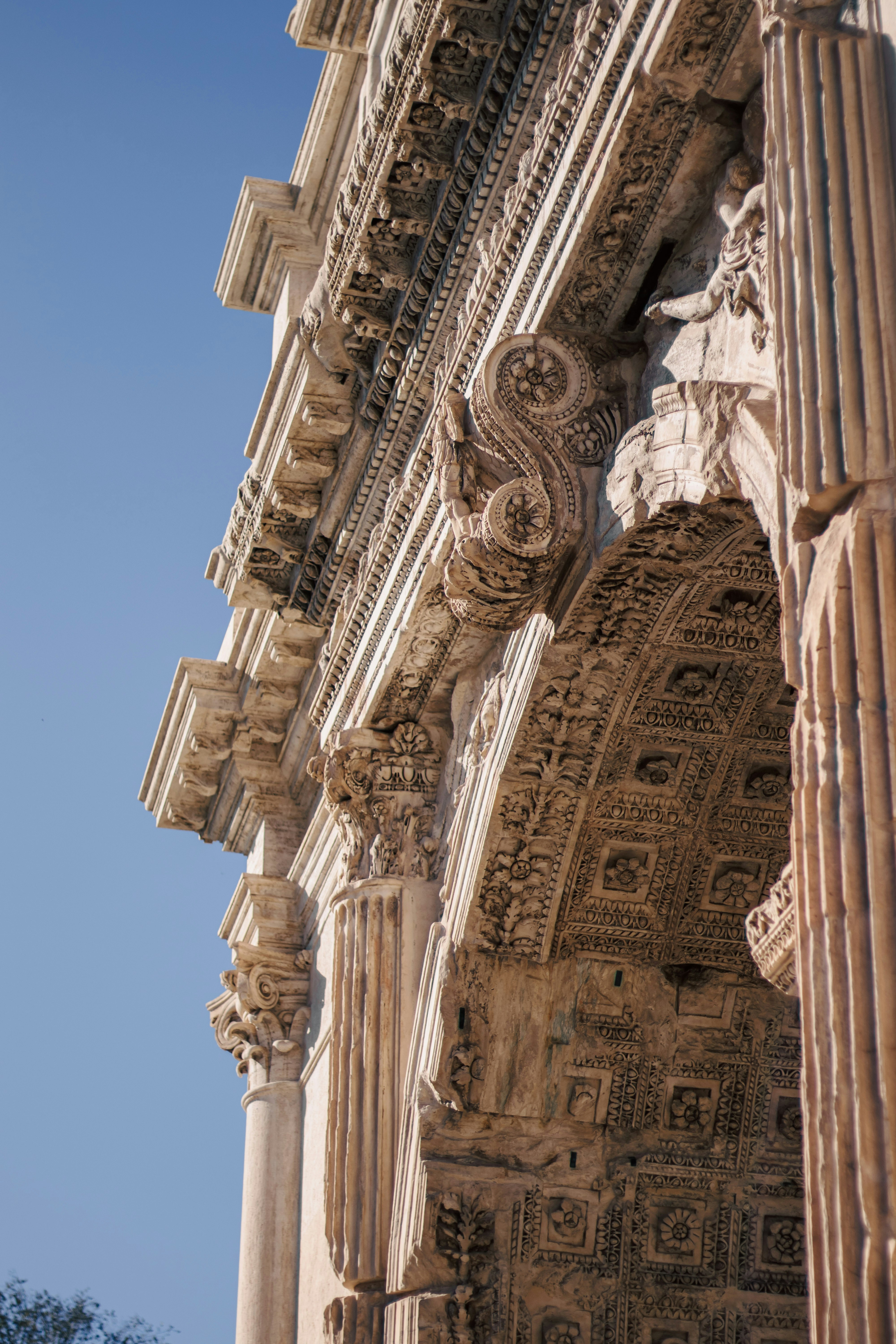 Intricate details of an ancient roman archway