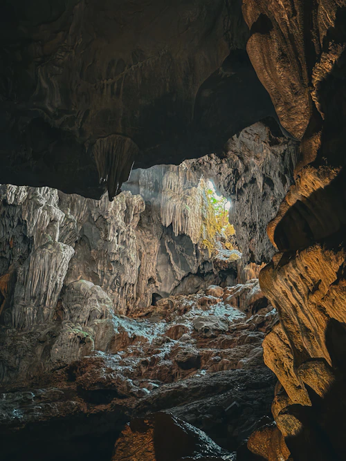 Musicians performing inside a natural cave, where acoustics meet geology
