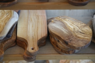 Wooden cutting boards with natural grain patterns.
