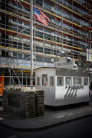 Checkpoint charlie with us flag and scaffolding