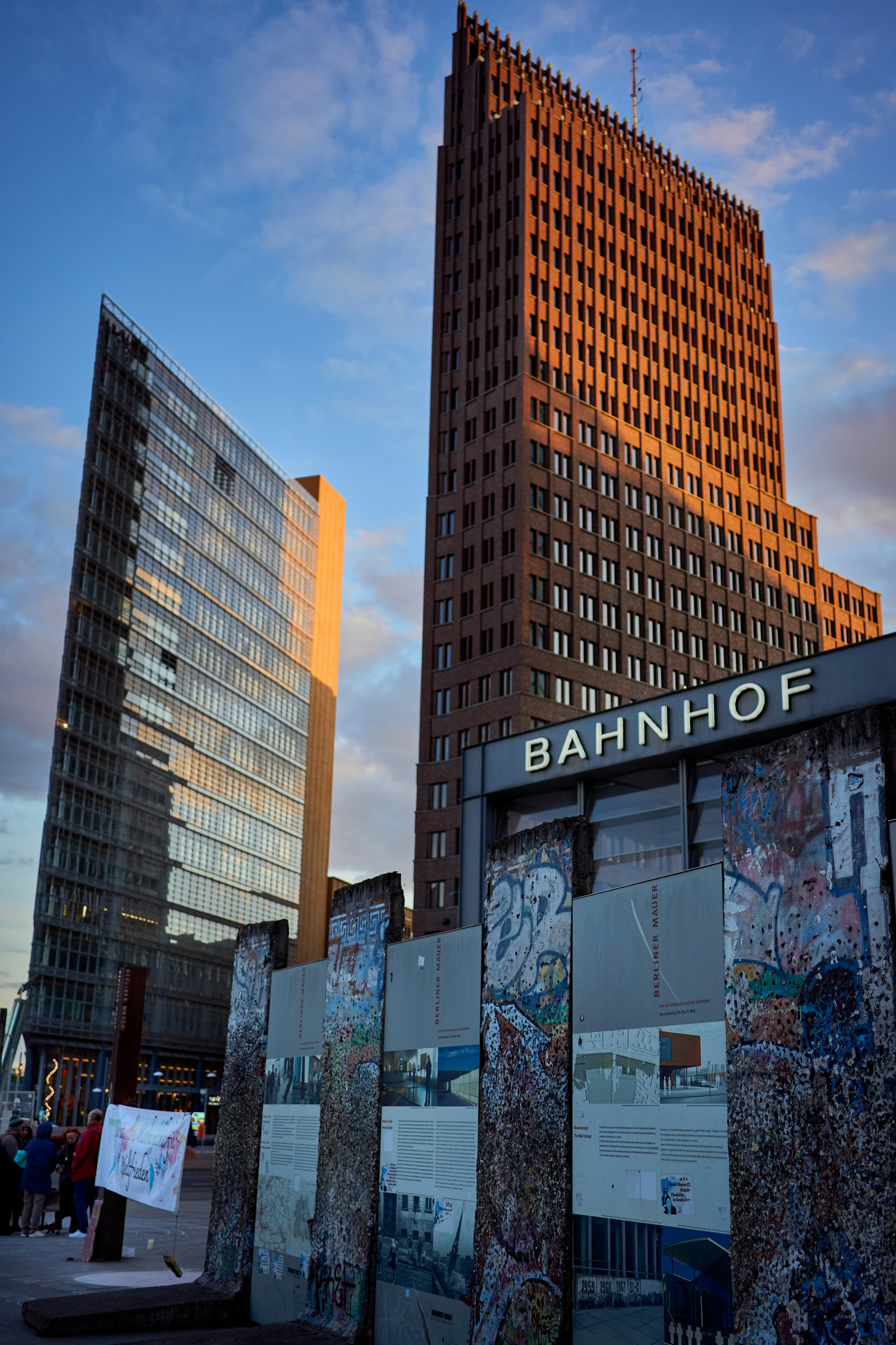 Modern buildings behind a historic wall