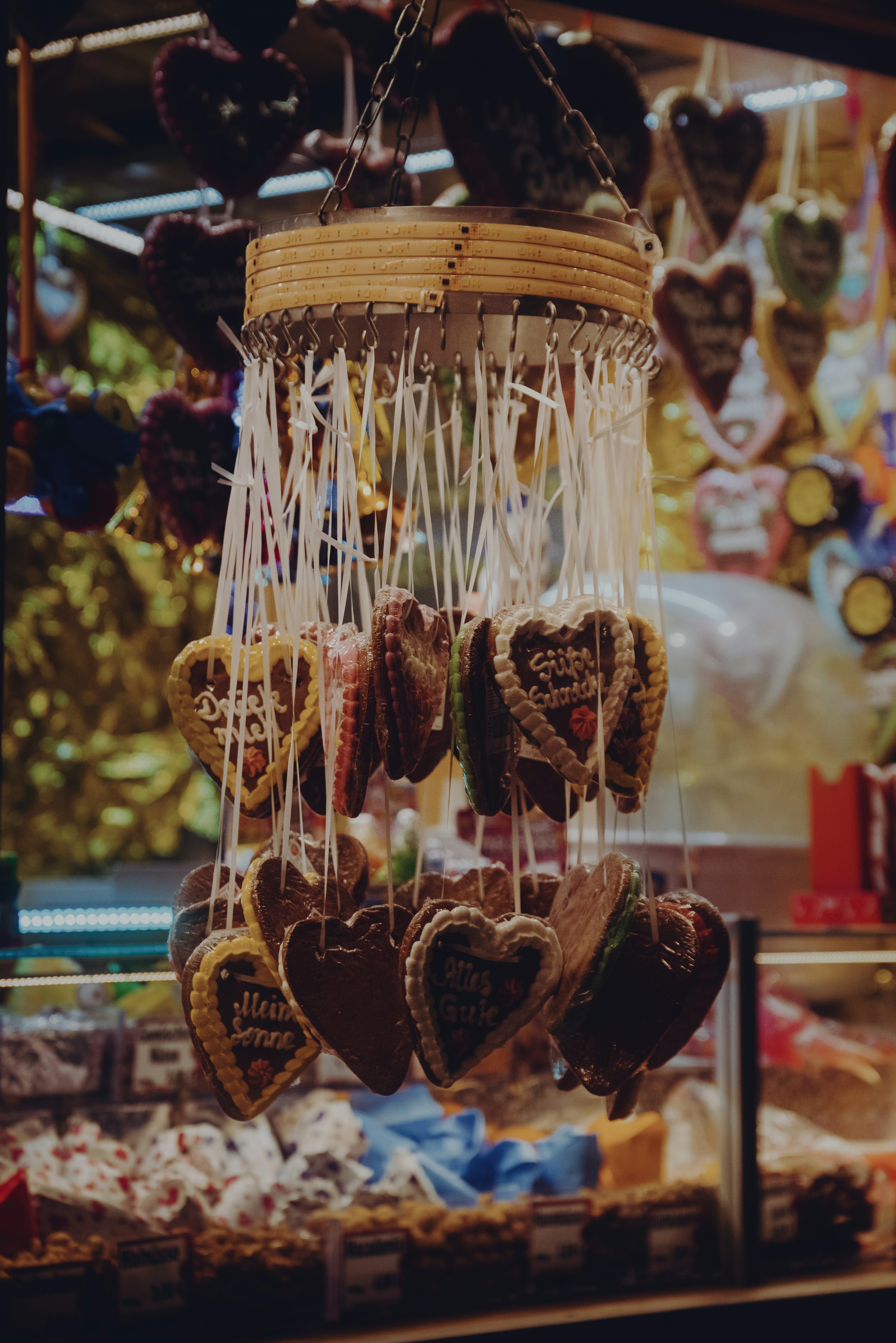 Heart-shaped cookies hanging from a display