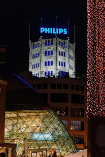 Philips building illuminated at night with christmas lights