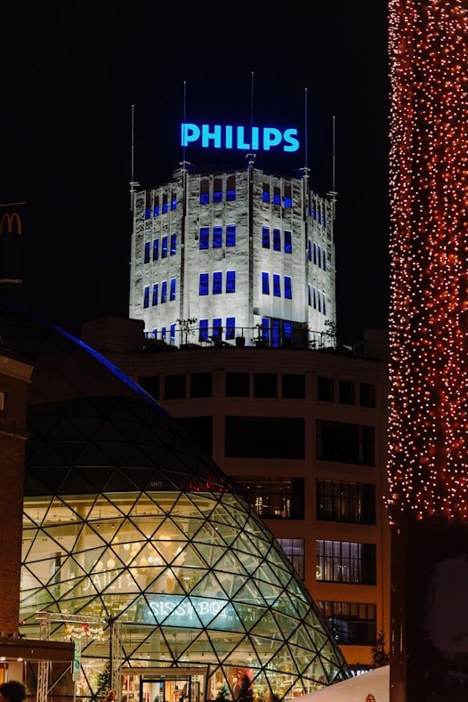 Philips building illuminated at night with christmas lights