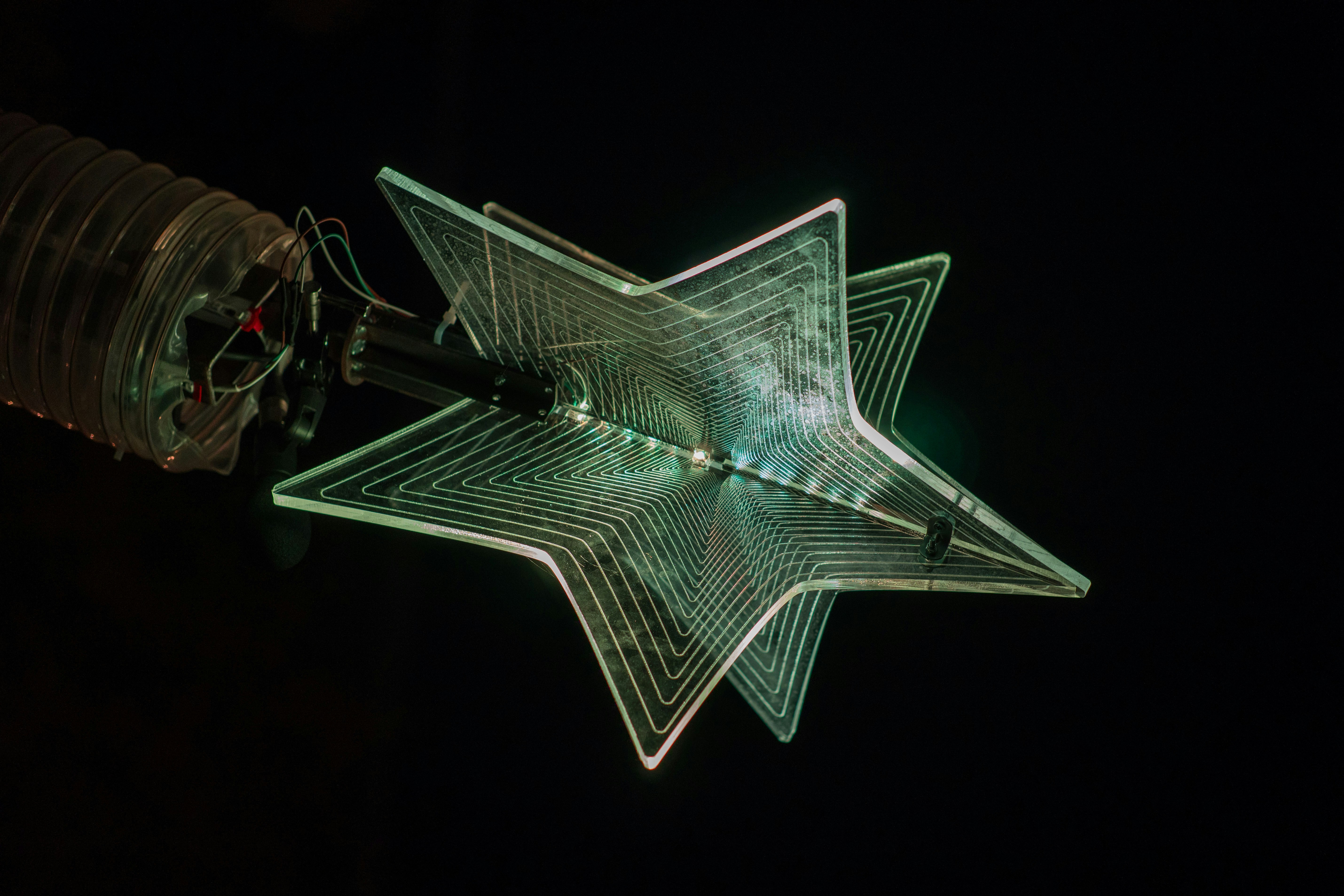 A star-shaped object with a dark background
