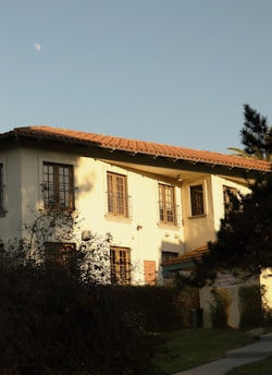 A building with a tiled roof under a clear sky.