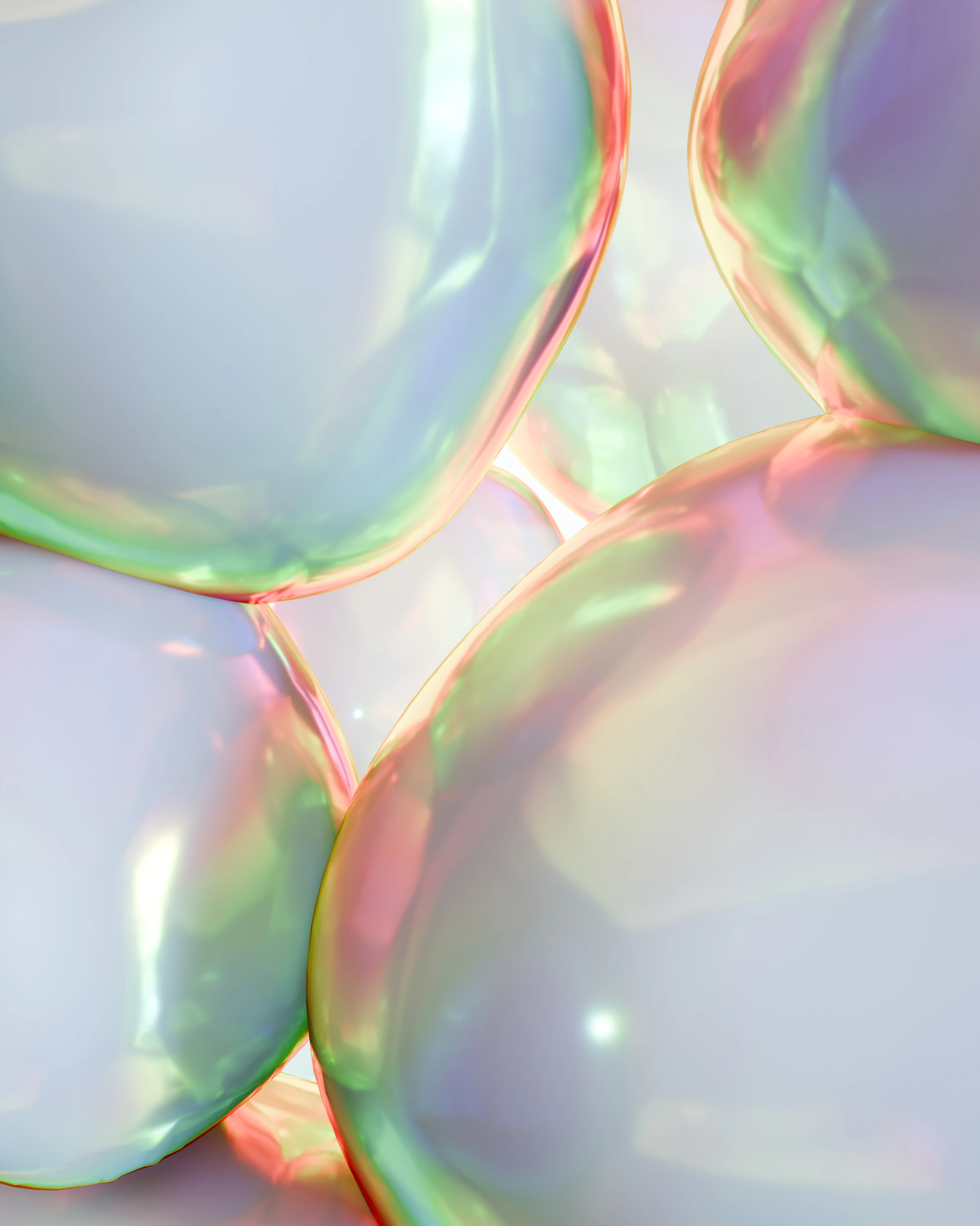 Close-up of iridescent, translucent spheres with soft light.