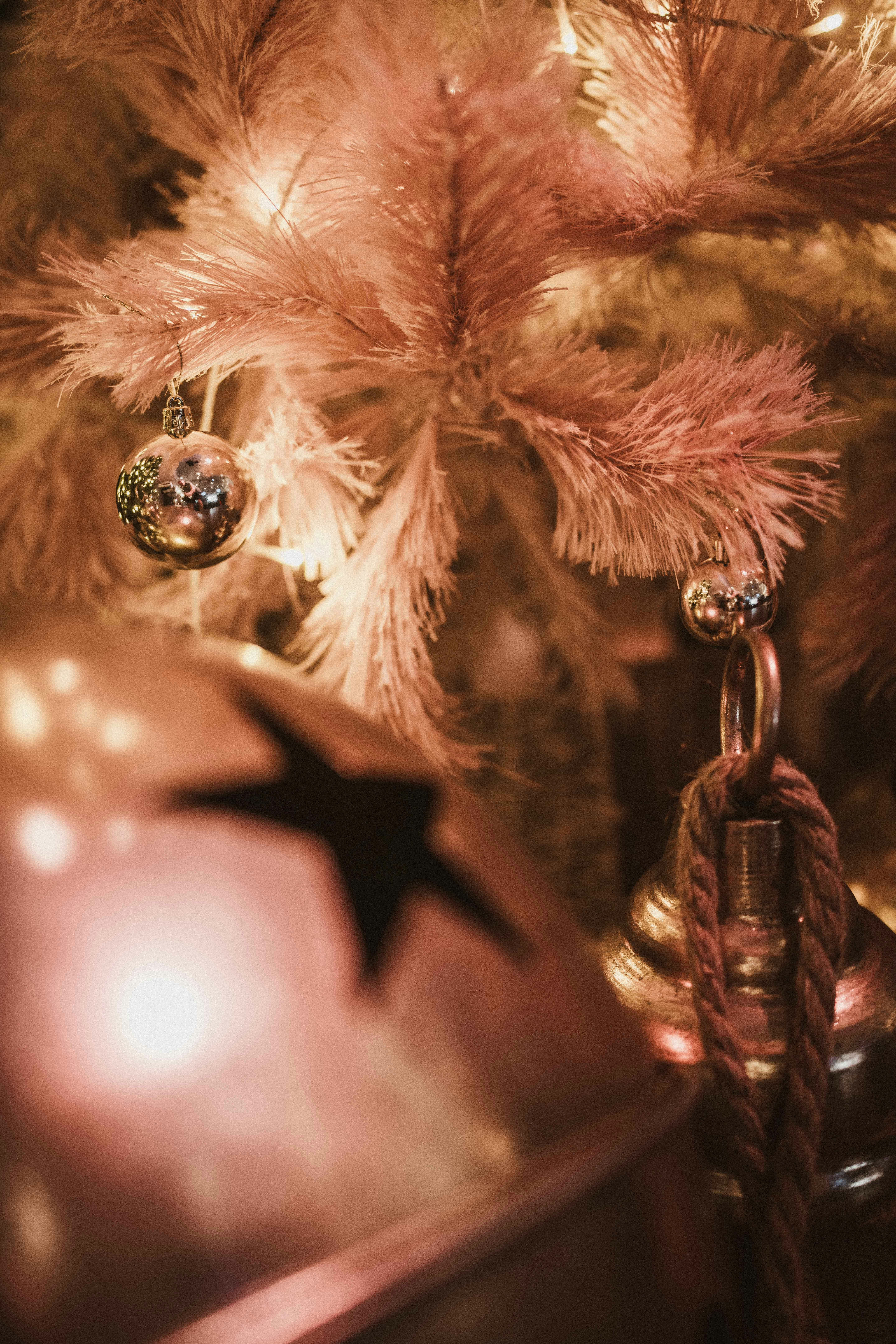 Close-up of a decorated christmas tree with ornaments.