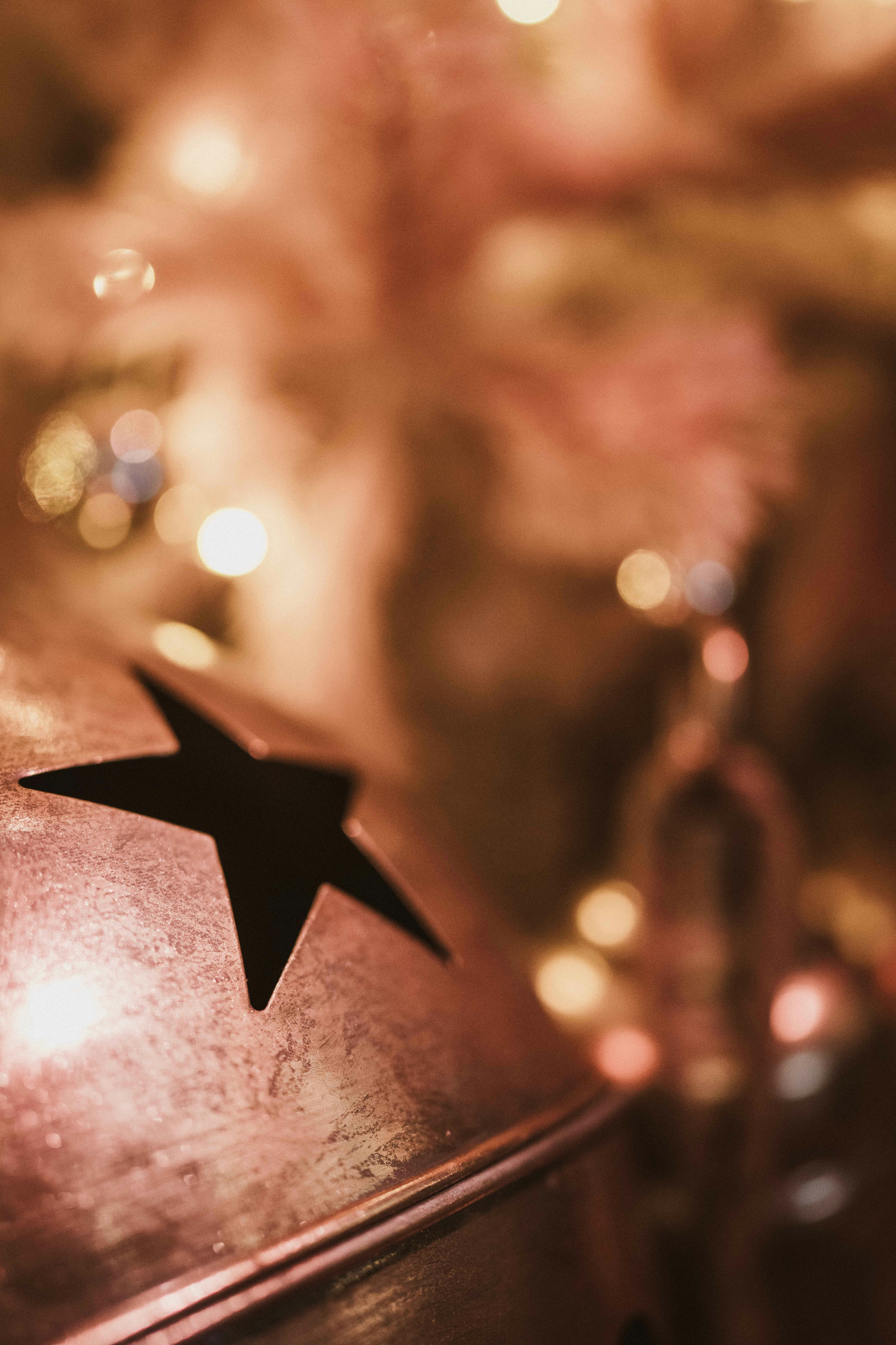 Close up of a jingle bell with a star cutout