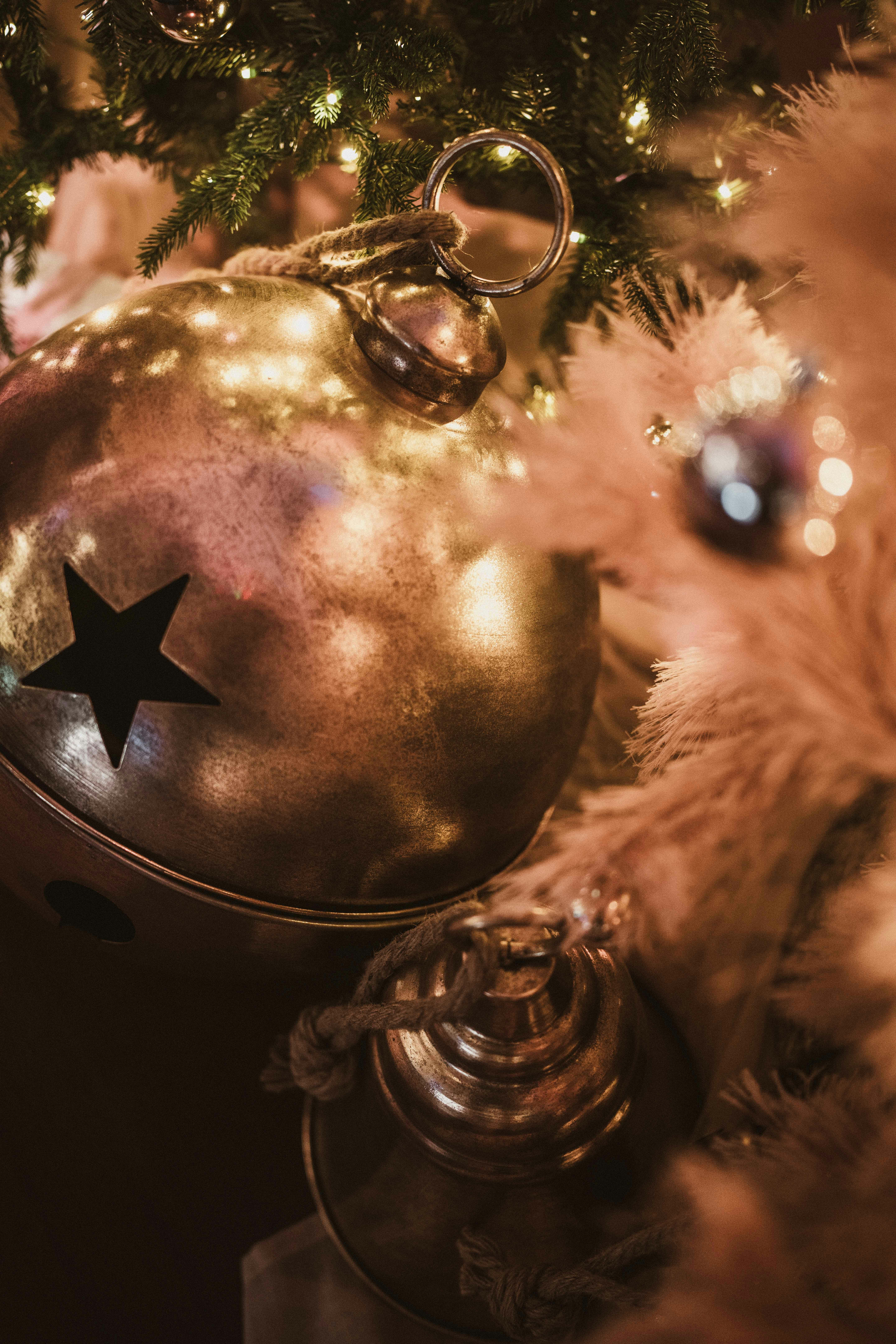 Close-up of rustic christmas tree ornaments with lights
