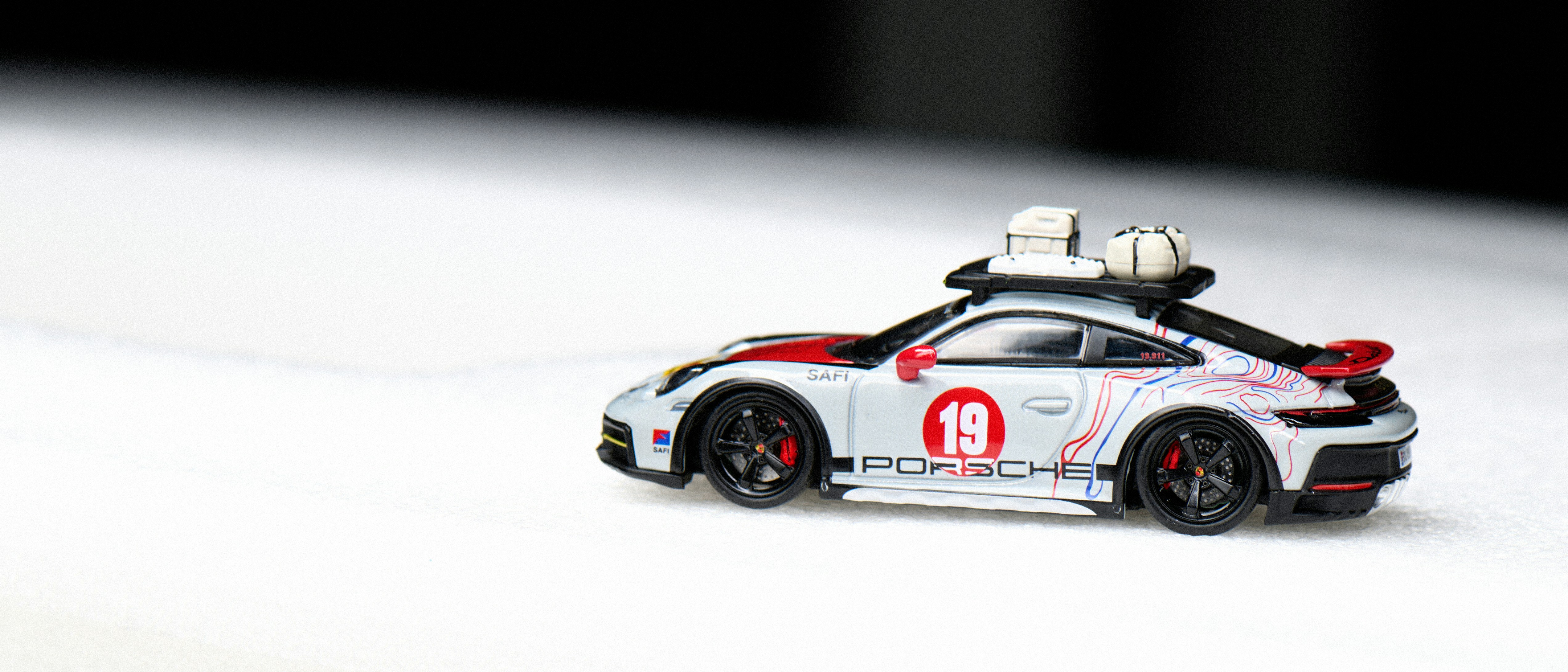 White porsche race car with number 19