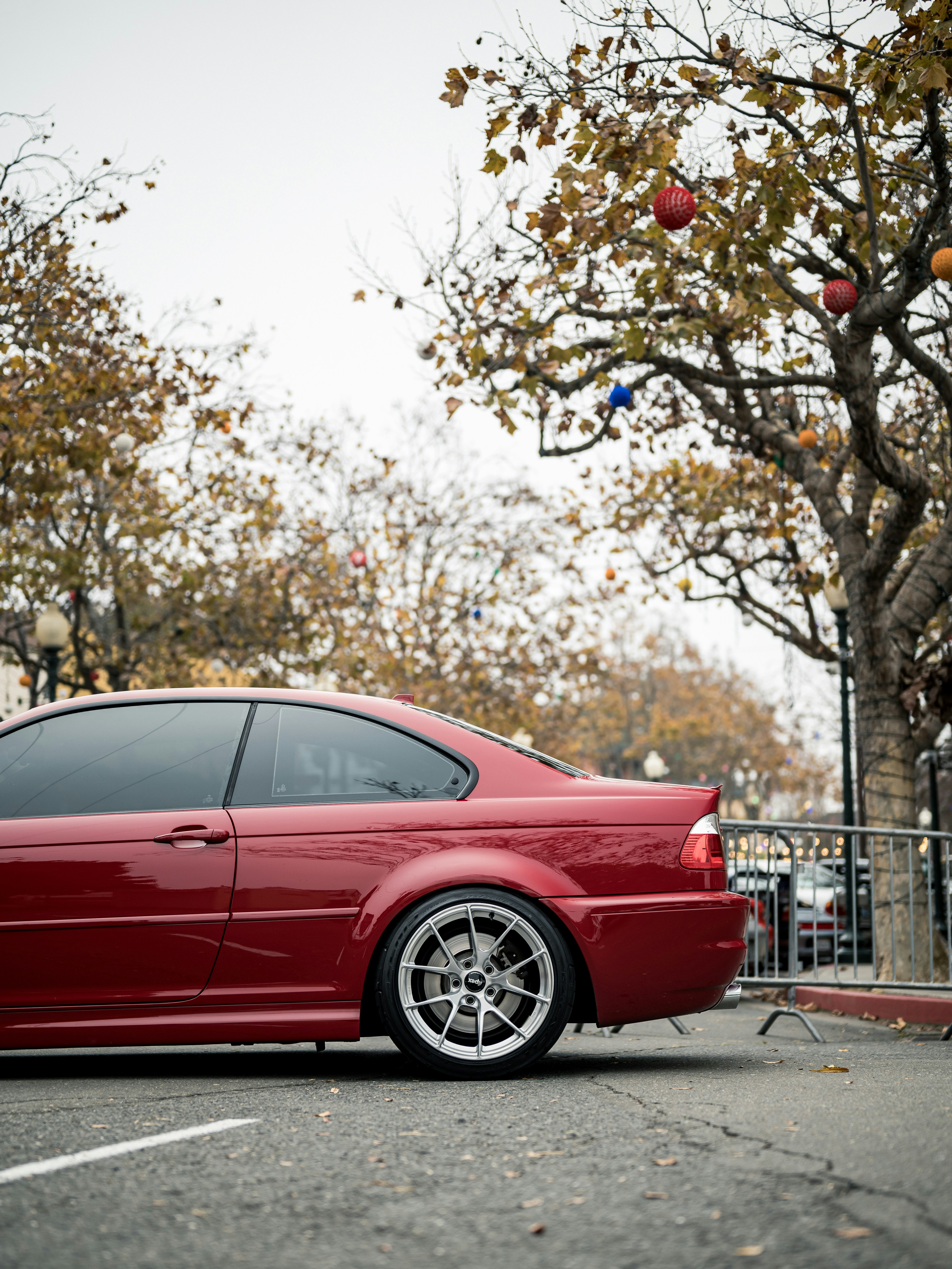 Red sports car parked on a street