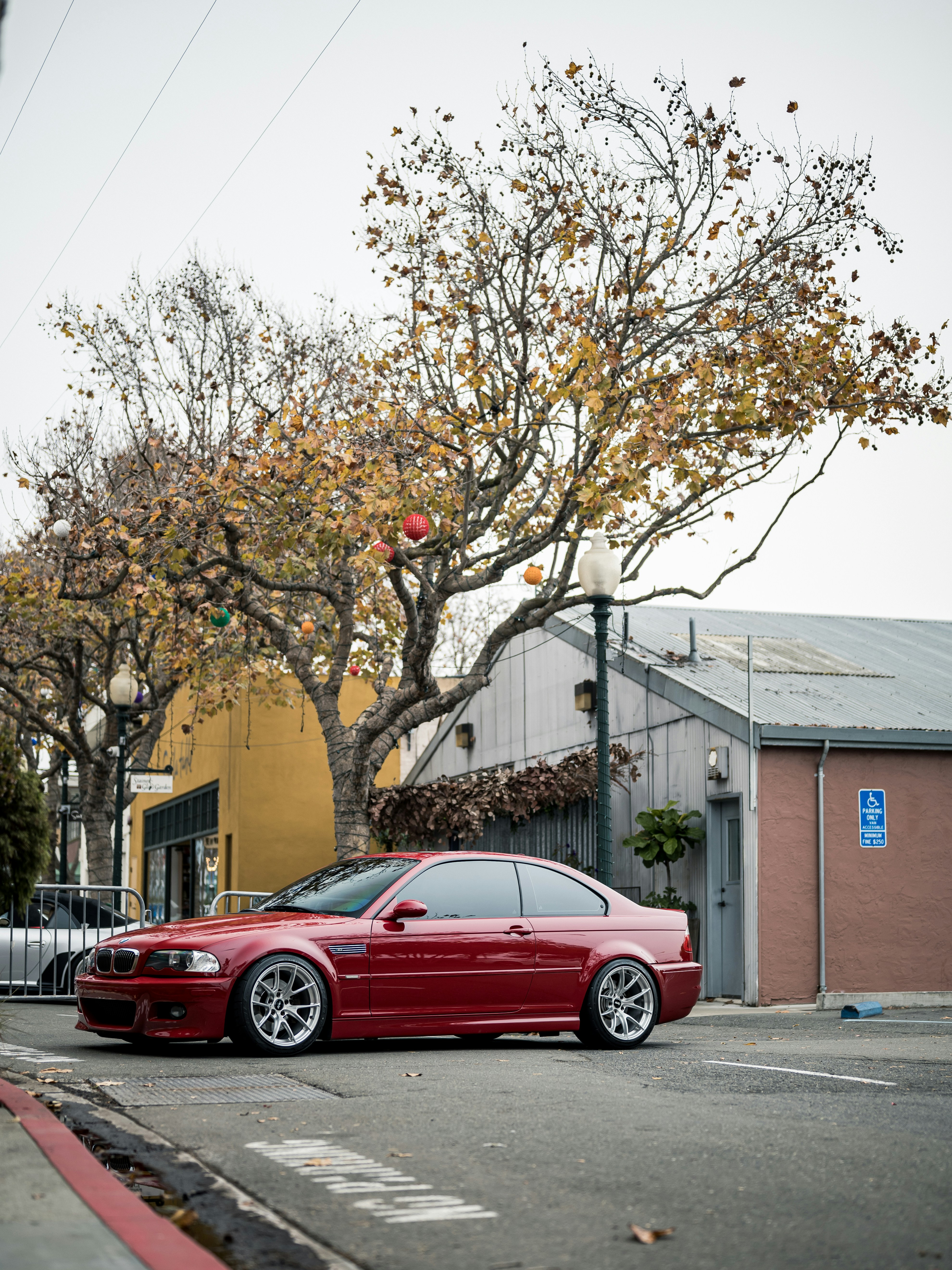 Red sports car parked on a street