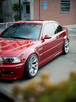Red sports car parked on a street