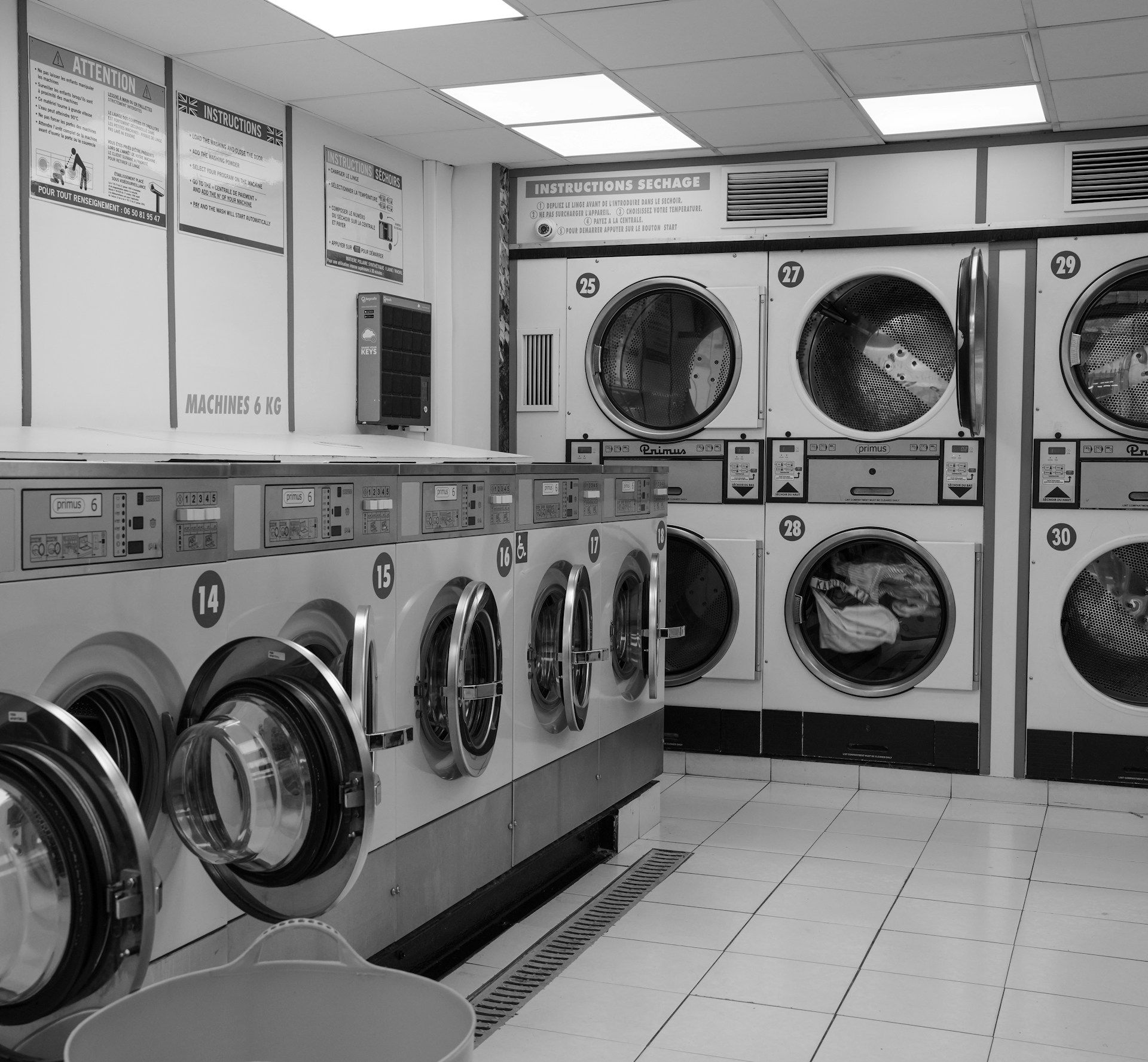 Row of washing machines in a laundromat
