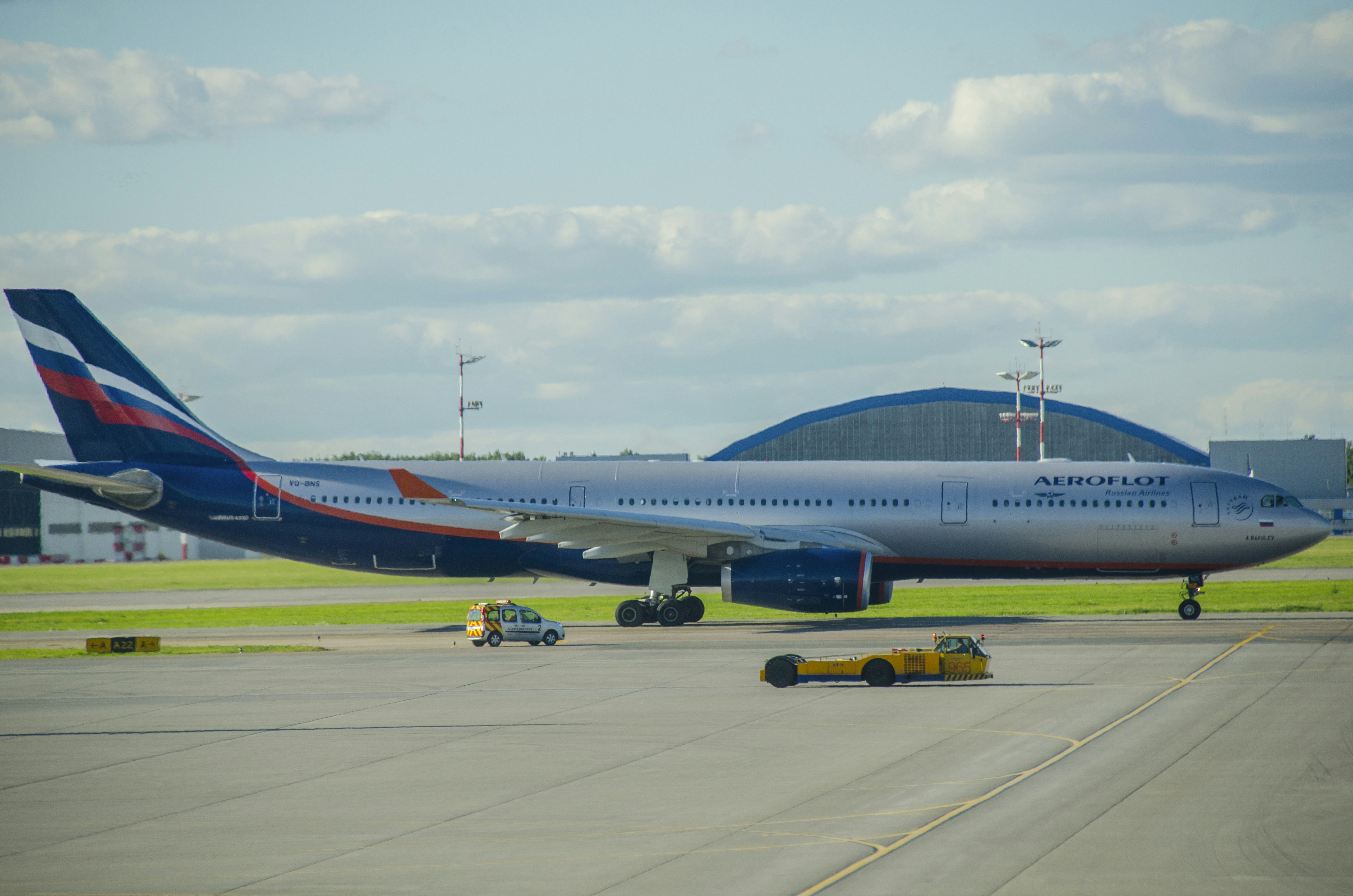 Aeroflot airplane on the tarmac at an airport.