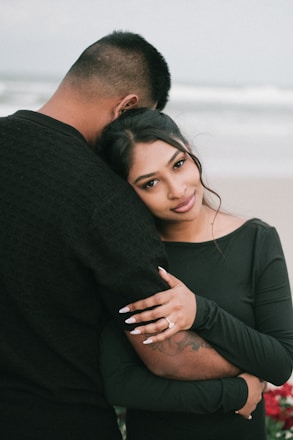A couple embracing on a beach
