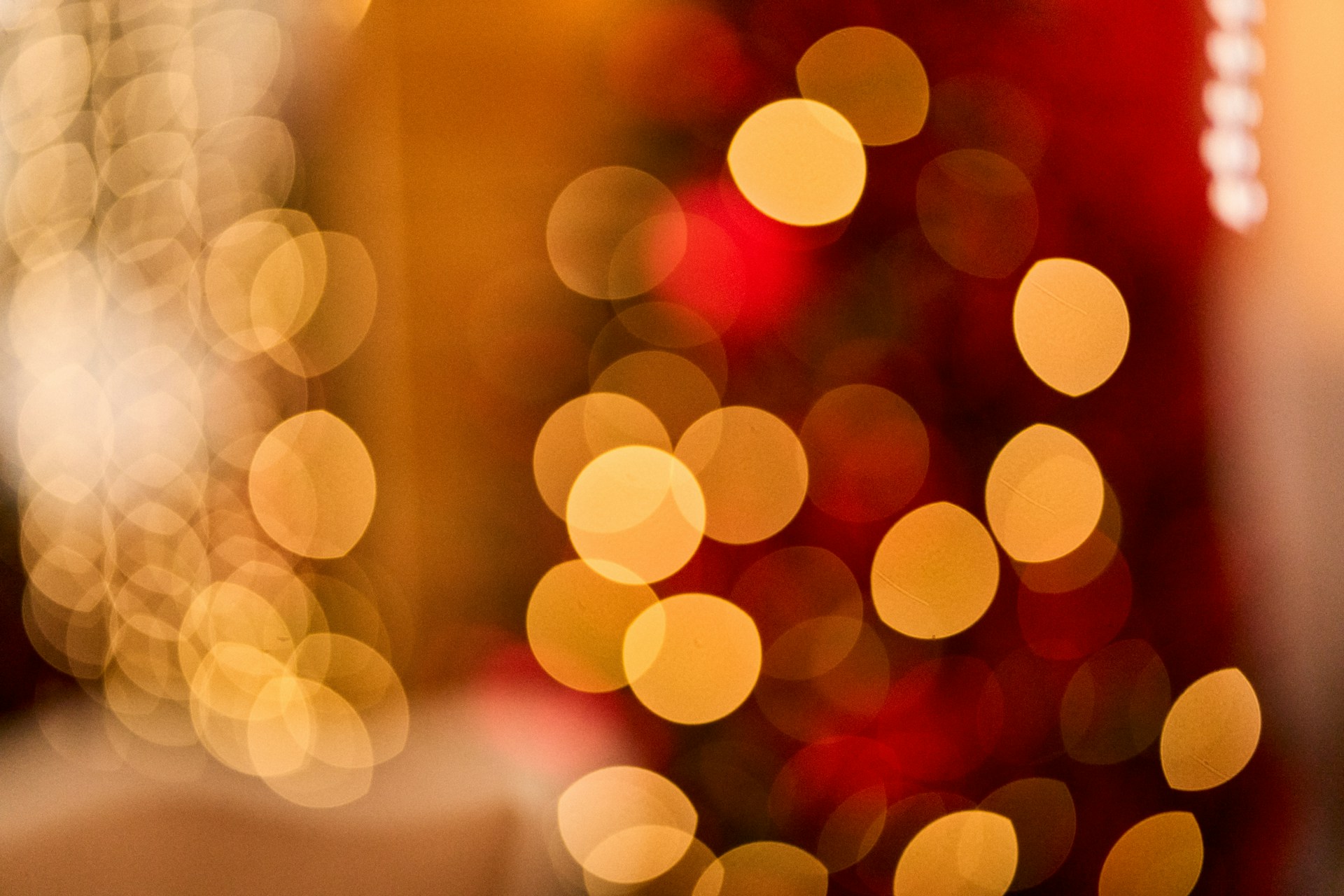 Golden and red bokeh lights abstract background