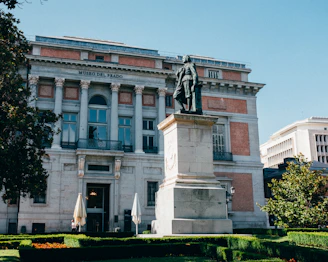 Museum building with a statue in front