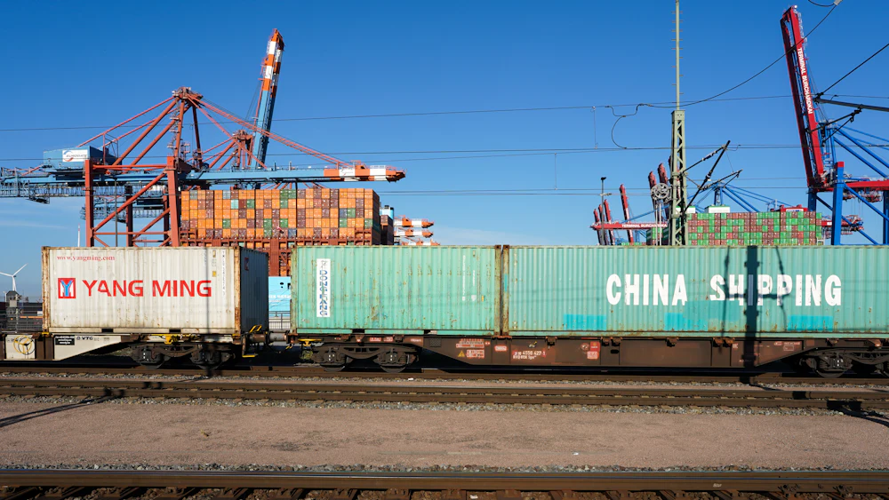 Shipping containers on a freight train at a port