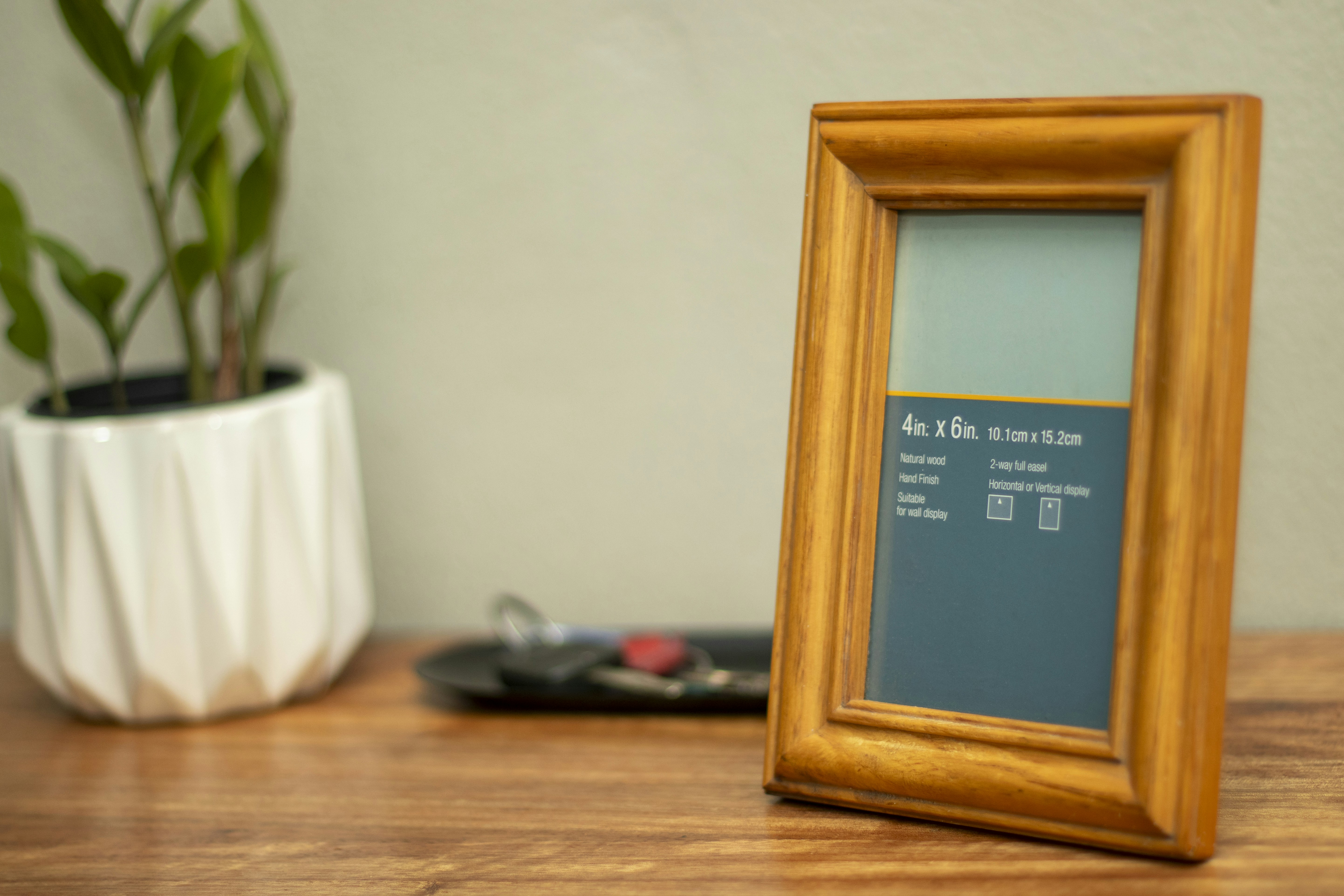 A model of a house surrounded by connected devices