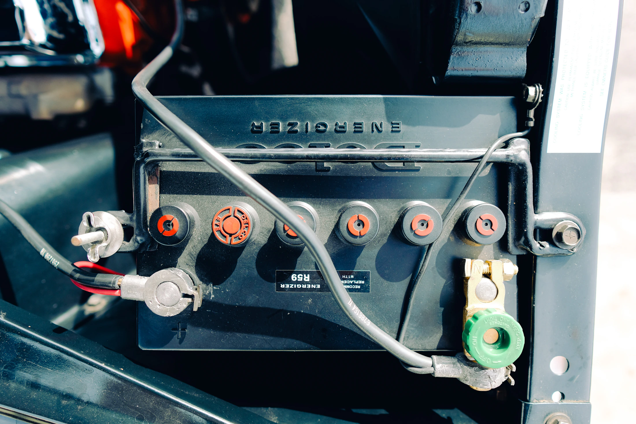 Car battery terminals and cables in close detail