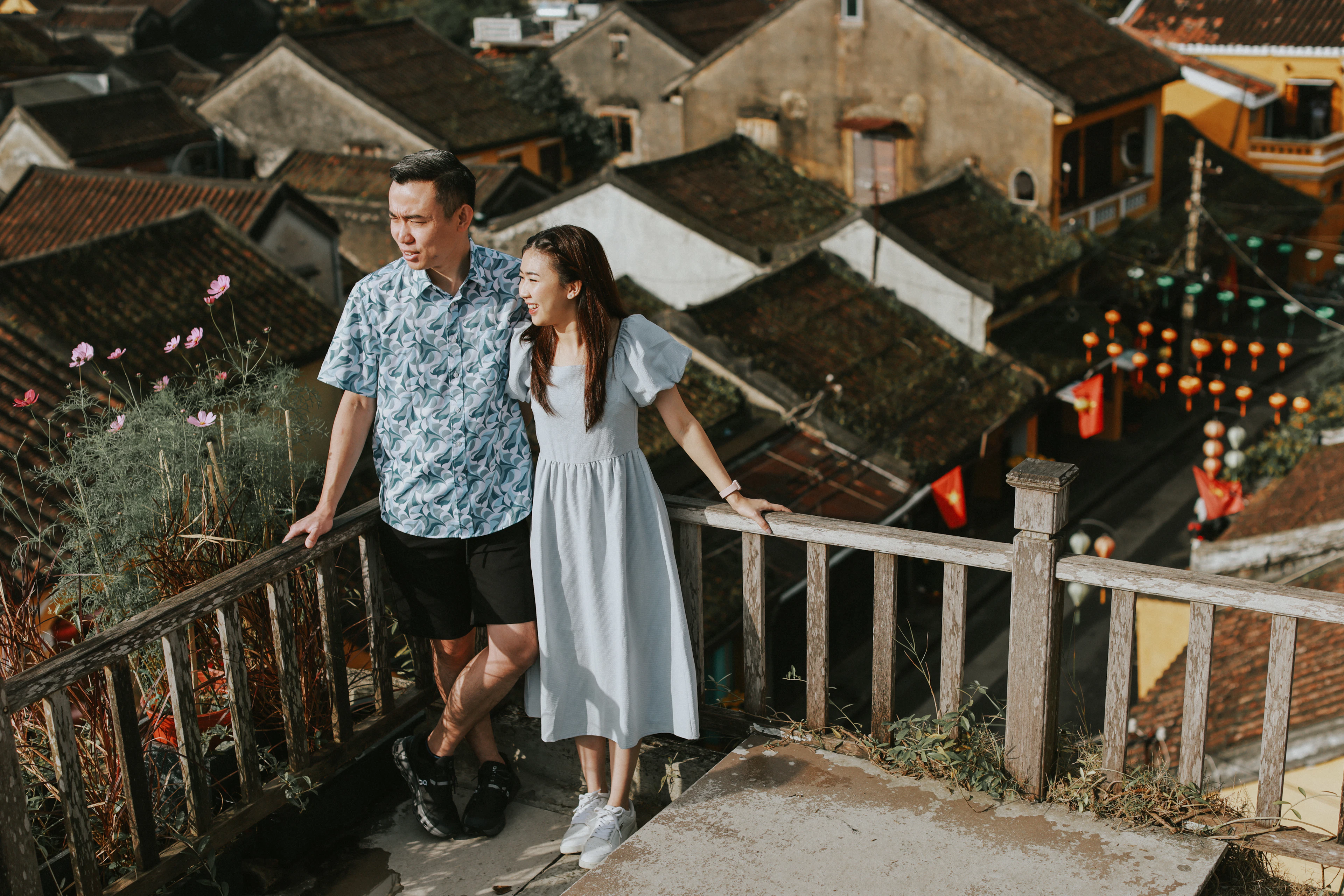 Couple on a balcony overlooking Bern