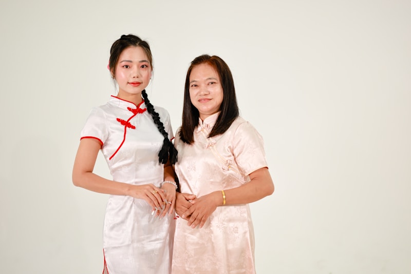 Group of diverse sugar mama members in traditional dress