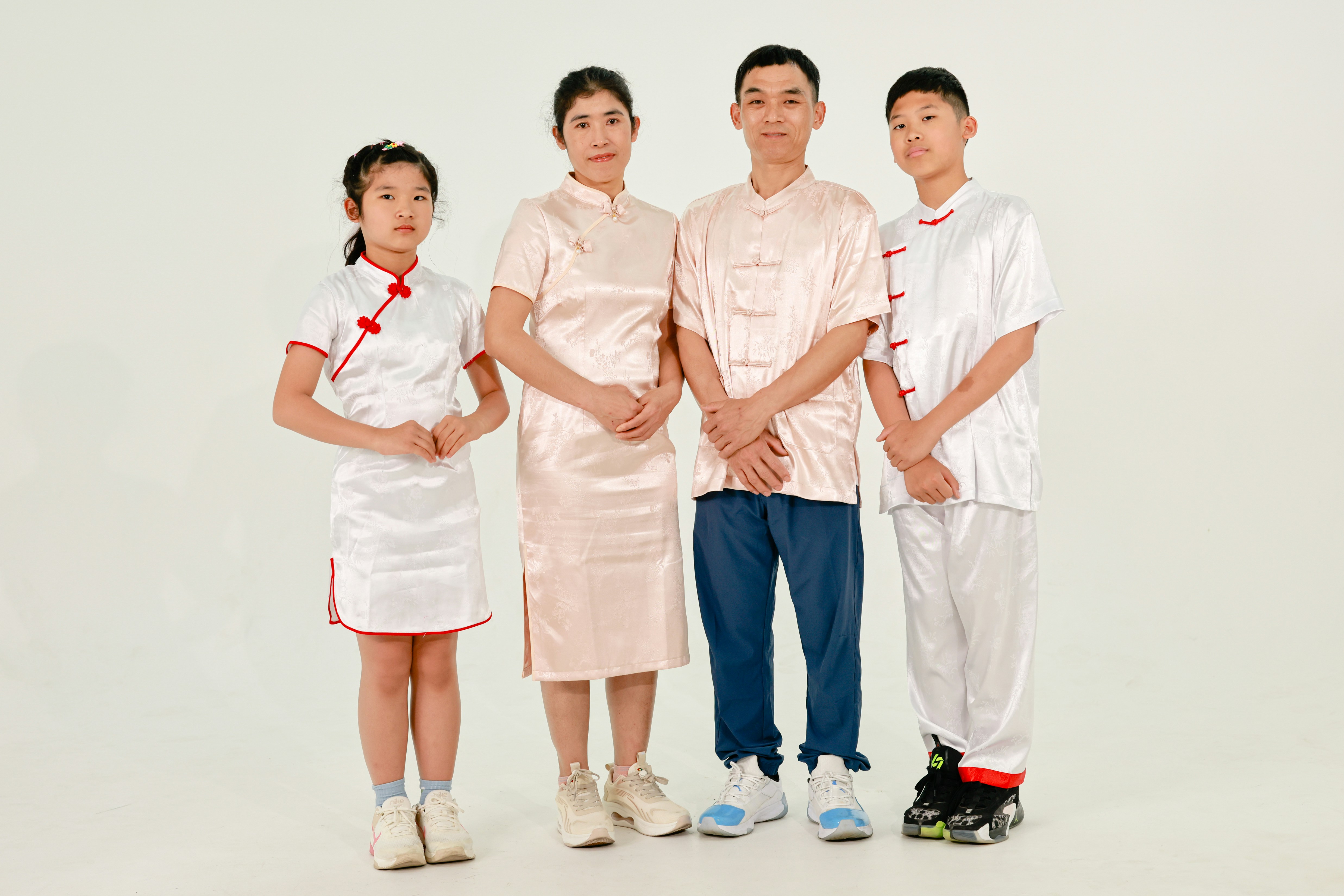 Family of four in traditional chinese clothing