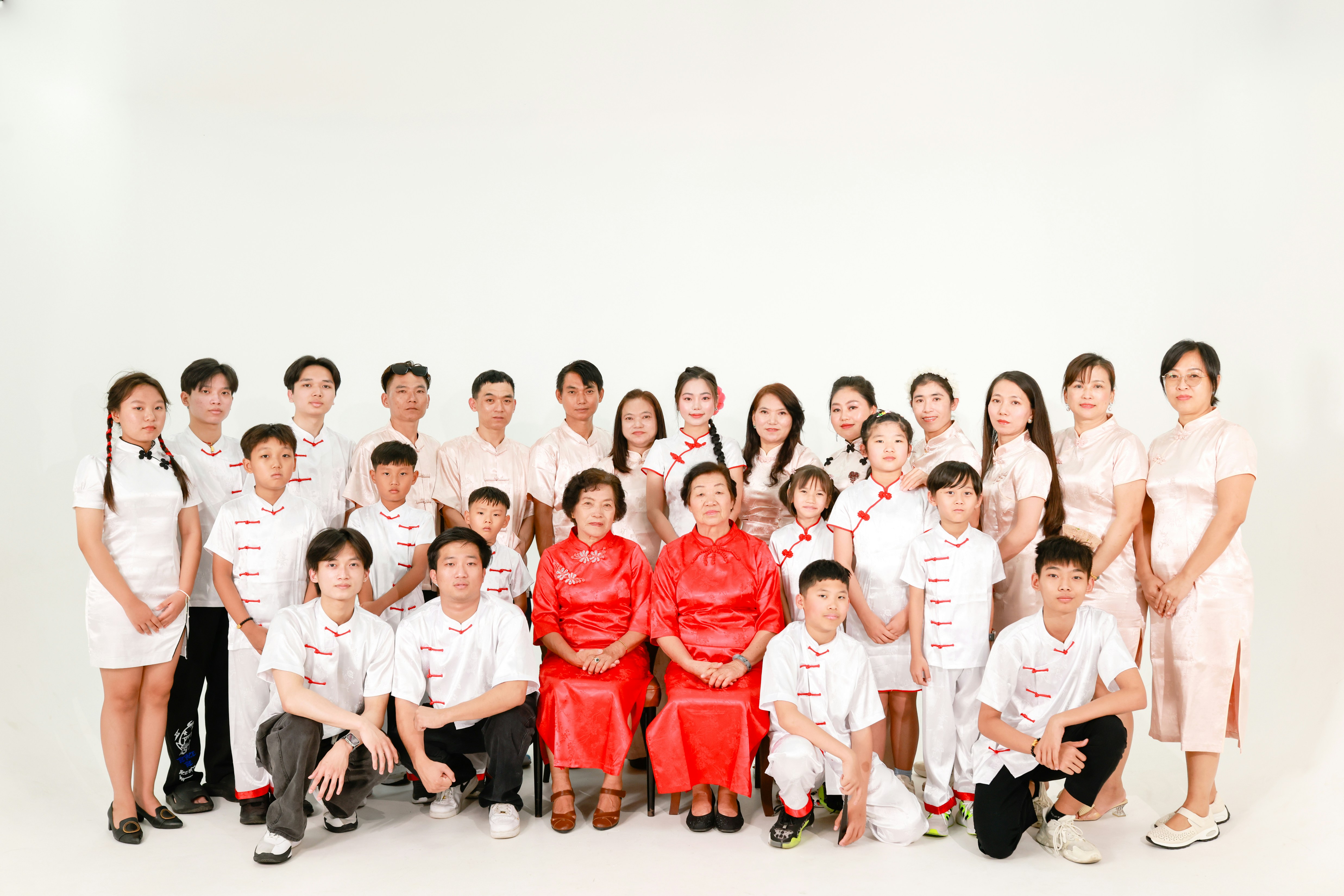 A large family posing for a group portrait.