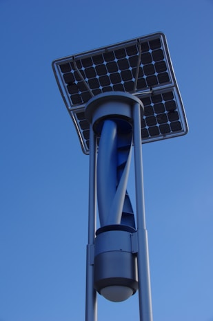 Solar panel and wind turbine on a pole