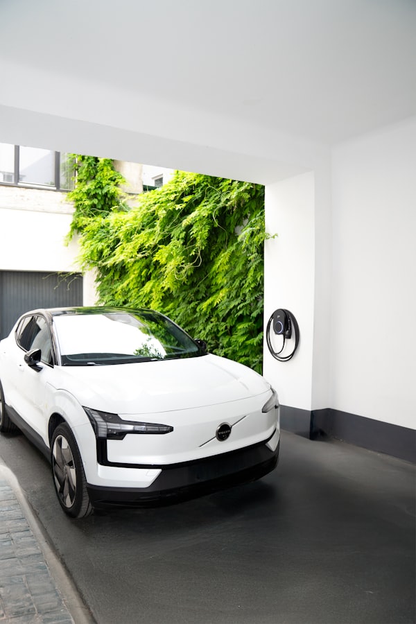 Electric vehicle charging station near a modern wall