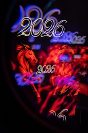 Two horses with 2026 text