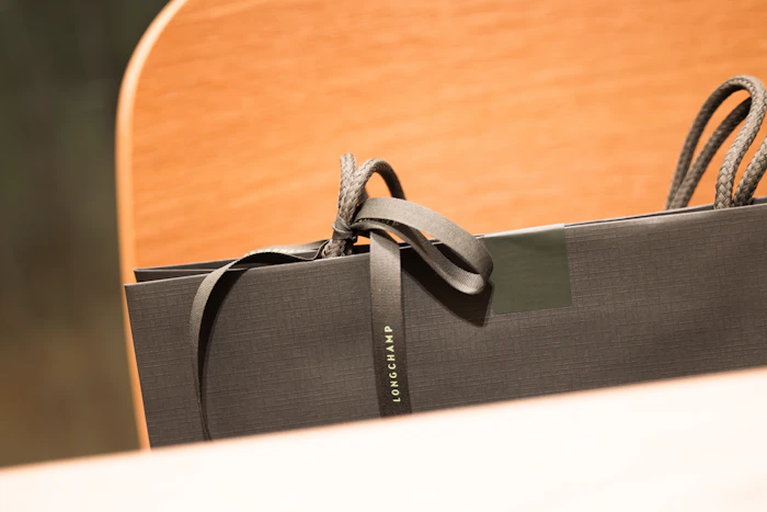 Black luxury shopping bag with ribbon