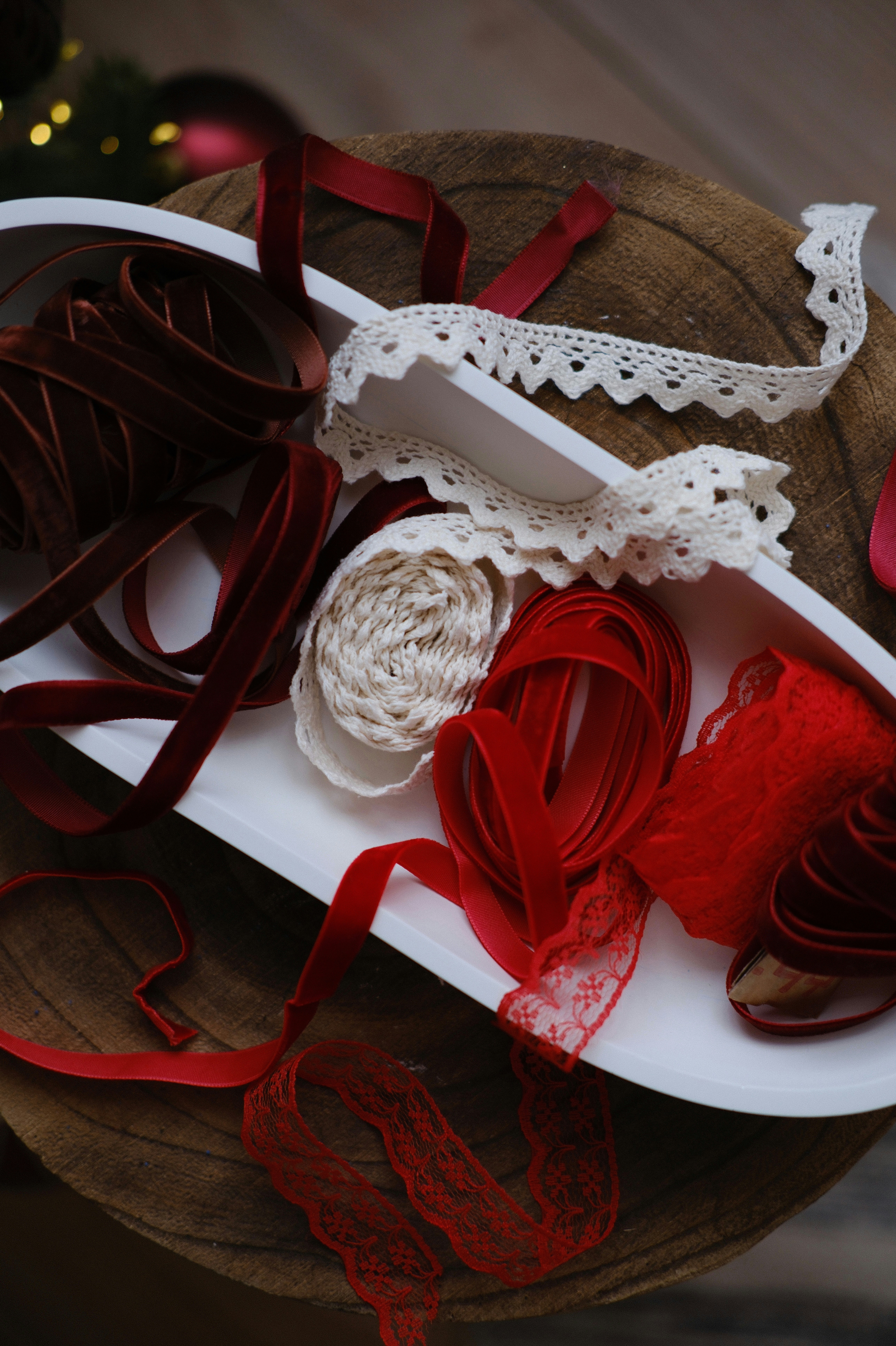 Assortment of red and white ribbons and twine